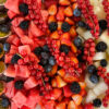 Berries, passion fruit and pineapple on a platter